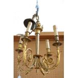 A Louis XVI style gilt bronze four branch chandelier, modern,