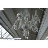 A 20th century cut glass ten light chandelier, 65cm wide x 100cm high.