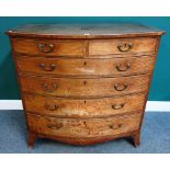 A late George III crossbanded mahogany bowfront chest of two short and four long drawers on splayed