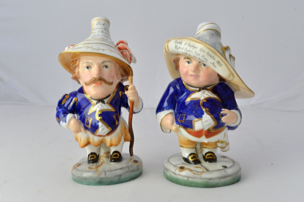 A pair of Royal Crown Derby dwarves, each commemorating Nelson's bicentennial anniversary,