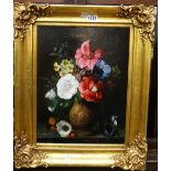 M** Henry (19th century), Still life of spring flowers in a vase, oil on canvas, bears a signature,