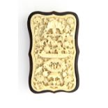 A Canton ivory card case, late 19th century, of shaped rectangular form,