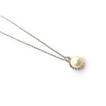 A white gold pendant, mounted with a single cultured pearl, with a white gold oval link neckchain,
