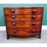 A Victorian mahogany bowfront chest of four long graduated drawers on splayed bracket feet,