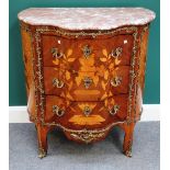 An 18th century style marble topped gilt metal mounted marquetry inlaid kingwood serpentine three