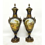 A large pair of gilt metal mounted Sevres style porcelain urn shaped vases, 20th century,