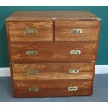 A campaign style teak two part chest of two short and three long drawers, 97cm wide x 99cm high.