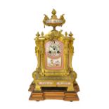 A French gilt metal and porcelain mounted mantel clock, 19th century,