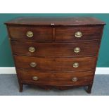 A Regency mahogany bowfront chest of two short and three long graduated drawers,
