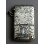 A late Victorian silver twin compartment vesta case of rectangular form,