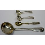 A foreign stylised fiddle pattern soup ladle, detailed 800,
