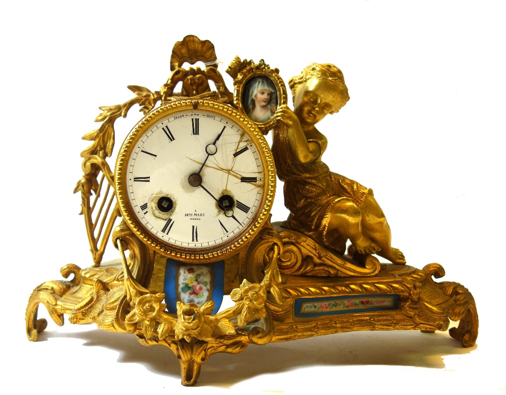 A French gilt metal and porcelain mantel clock, late 19th century,