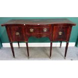 A George III mahogany serpentine three drawer sideboard, on tapering square supports,