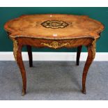 A Victorian gilt metal mounted marquetry inlaid figured walnut shaped centre table,