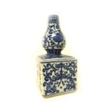 A Chinese porcelain blue and white vase, 20th century, of square form beneath a bulbous neck,