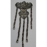 An Edwardian silver chatelaine belt clip fitted with give chains and swivels,