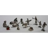 A group of twelve modern silver and enamelled models of animals and figures,