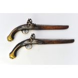 A pair of Continental flintlock pistols, 18th century, each with circular steel barrel, 25.
