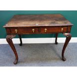 A George I style oak two drawer side table, on scroll feet, 98cm wide x 63cm deep.