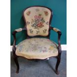 A Louis XV walnut fauteuil, with semi-padded open arms, on cabriole supports, 93cm high x 64cm wide.