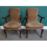 A pair of George II style mahogany open armchairs on cabriole supports, 95cm high x 67cm wide.