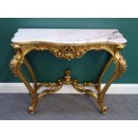 An 18th century style console table, the serpentine marble top over carved giltwood base,