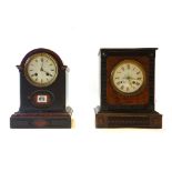 A Victorian black slate cased mantel clock,