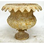 A Victorian white painted cast iron jardiniere with leaf moulded rim and semi fluted body,