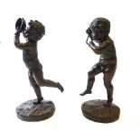 A pair of bronze cherubs, 19th century,