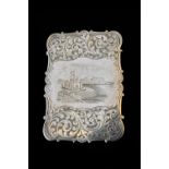 A Victorian silver 'castle top' card case of shaped rectangular form,