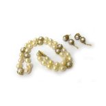 An 18ct gold and cultured pearl necklace by Charles de Temple,