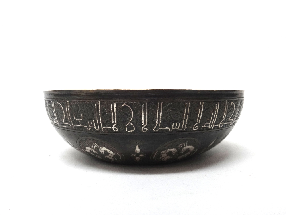 A Syrian silver inlaid brass bowl, possibly Raqqa 14th century or later,