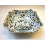 A Dutch Delft square bowl, 18th century, decorated with Oriental scenes, 21.