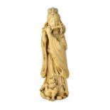 A Japanese ivory okimono of a woman, Meiji period, carved standing playing the flute,