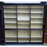 A Victorian stained pine double height open bookcase, 216cm wide x 213cm high.