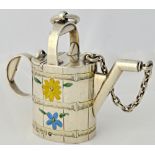 A Victorian silver novelty scent bottle formed as a watering can,