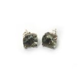 A pair of Tiffany & Co silver and pale green gemstone set single stone earstuds,