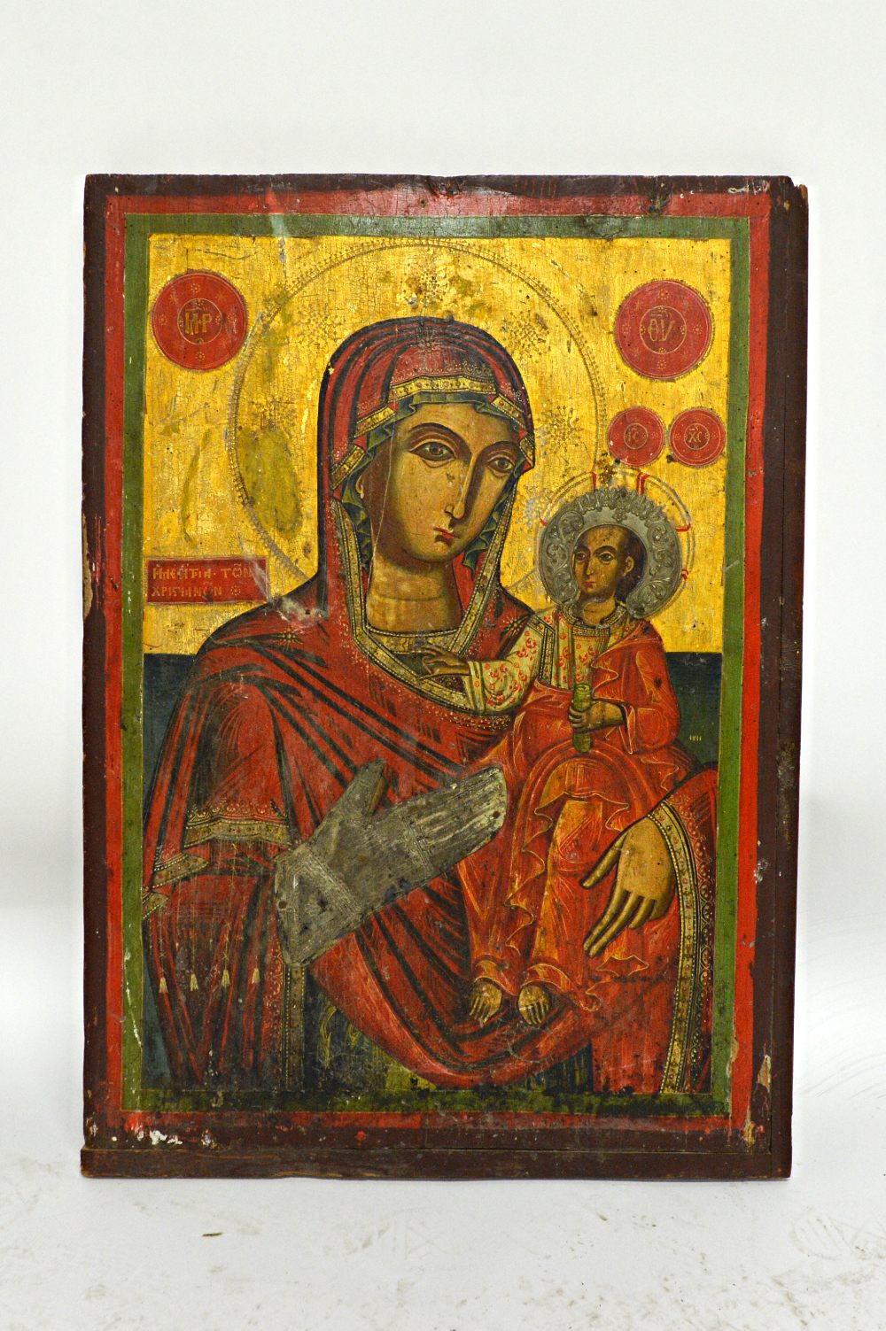 A Greek icon depicting Hodegetria the Mother of God, 19th century,70cm x 50cm.