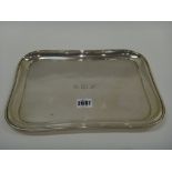 A silver rectangular dressing table tray, engraved with the initials S.W.