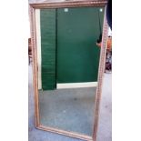 A 19th century oak rectangular mirror with egg-and-dart carved frame,
