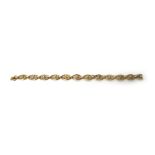 A gold oval link bracelet,