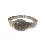 A Bueche-Girod 9ct white gold lady's bracelet wristwatch, the signed oval bark textured dial,