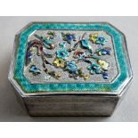 A 19th century Chinese or Japanese silver and enamelled trick opening pill box of cut cornered