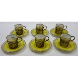 A set of six Aynsley porcelain coffee cups and saucers,