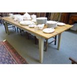 A 20th century kitchen table, the bois blanc top over a green painted base,