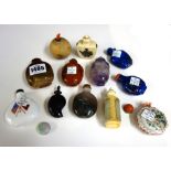 A group of twelve Chinese snuff bottles, 19th/20th century, various materials,