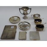 A lady's silver compact of square form, with engine turned decoration, Birmingham 1921,