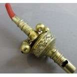 A George III silver-gilt baby's rattle and whistle,