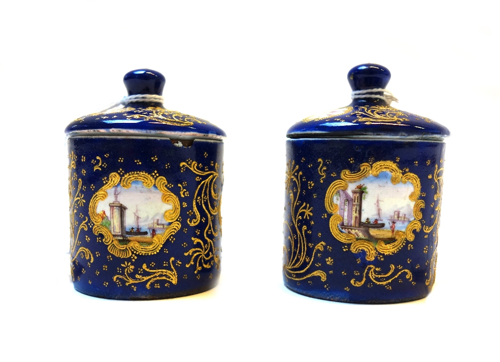 A pair of enamelled copper pots and covers, late 18th century, painted with exotic birds,