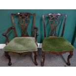 A set of six mid-18th century style carved mahogany dining chairs, to include a pair of carvers (6).